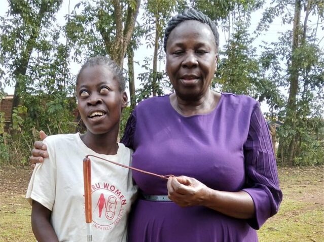 Elizabeth Naika coordinating a workshop